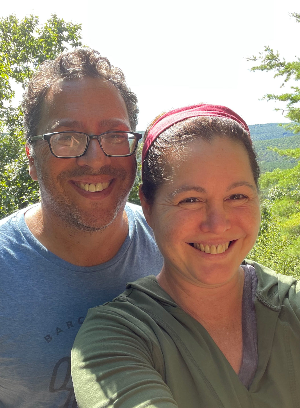 Smiling couple taking a selfie outdoors