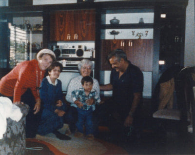 Vintage photo of a family gathered in a living room