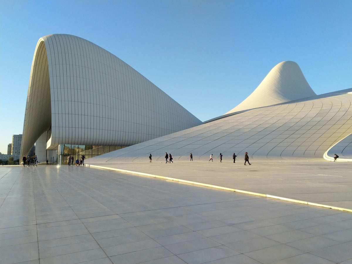Heydar Aliyev Center's flowing white curves and open plaza