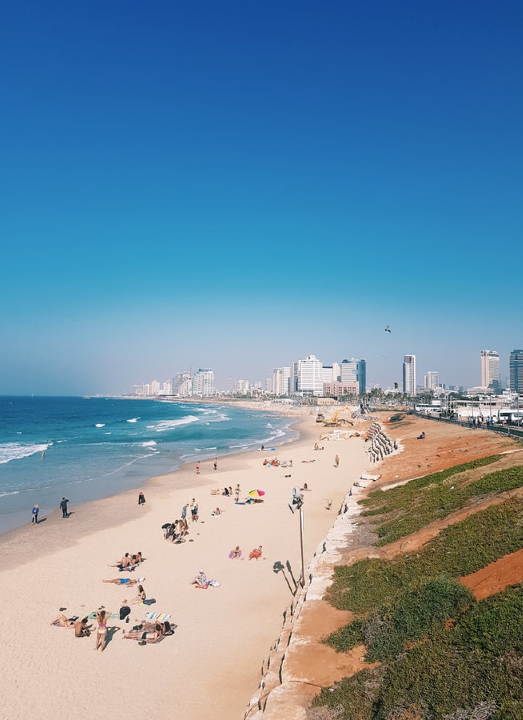 Tel Aviv beach and Mediterranean coastline with the city skyline