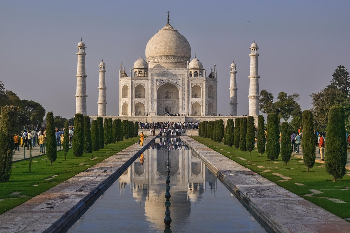 Taj Mahal reflected in its long garden pool